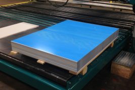 painted steel blanks on the press from Wrisco