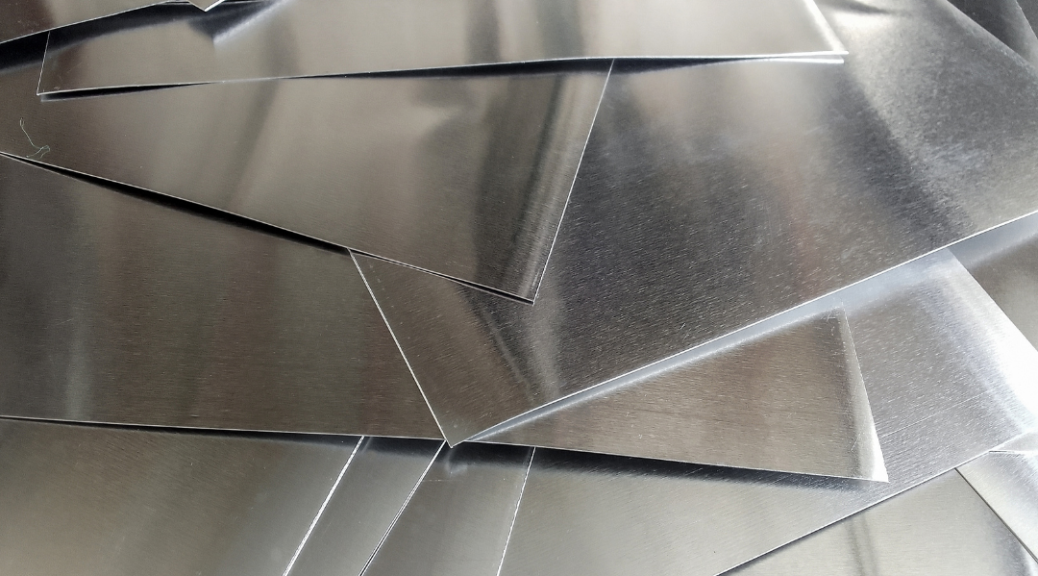 sheets of aluminum laid on top of one another